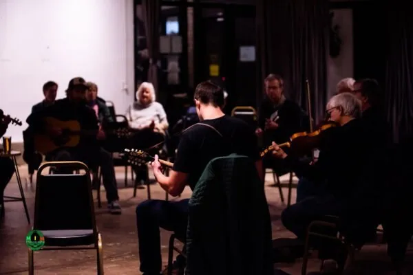 Musicians gathered in the Transfer Co. Ballroom for a PineCone jam