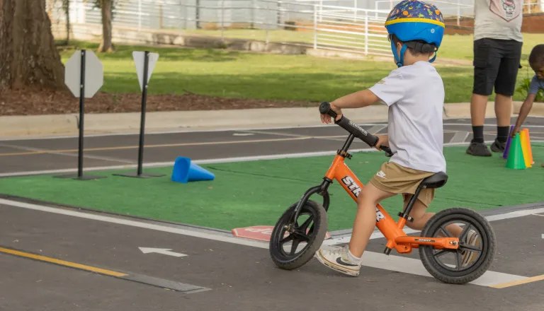 kid riding bike