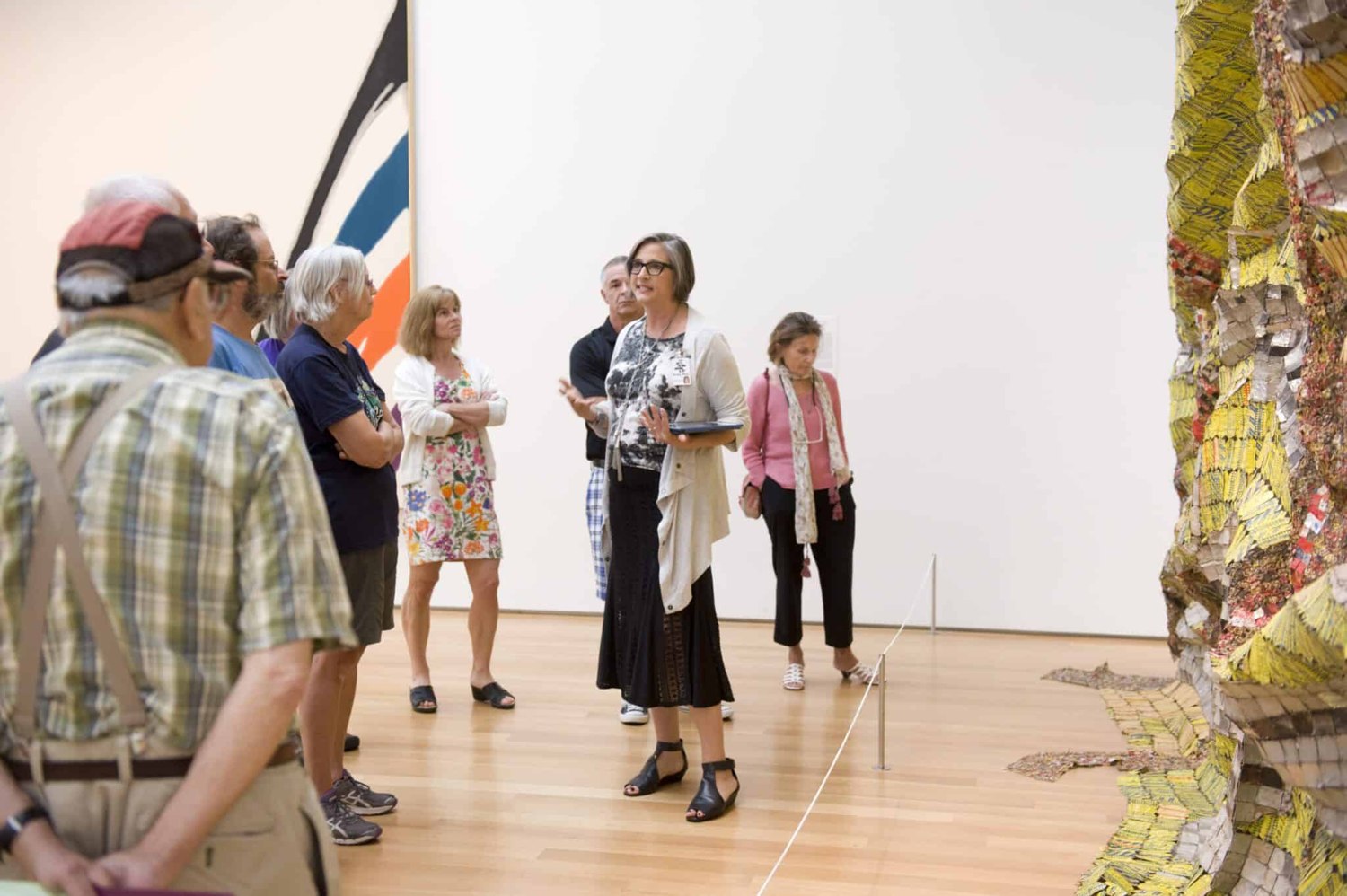 Visitors with a docent at NCMA · museum publicity photograph