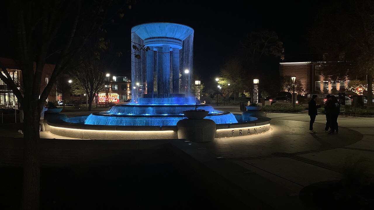 Frantz Square fountain illuminated at Downtown Cary Park in November 2023