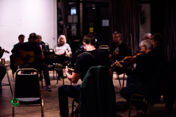Musicians gathered in the Transfer Co. Ballroom for a PineCone jam